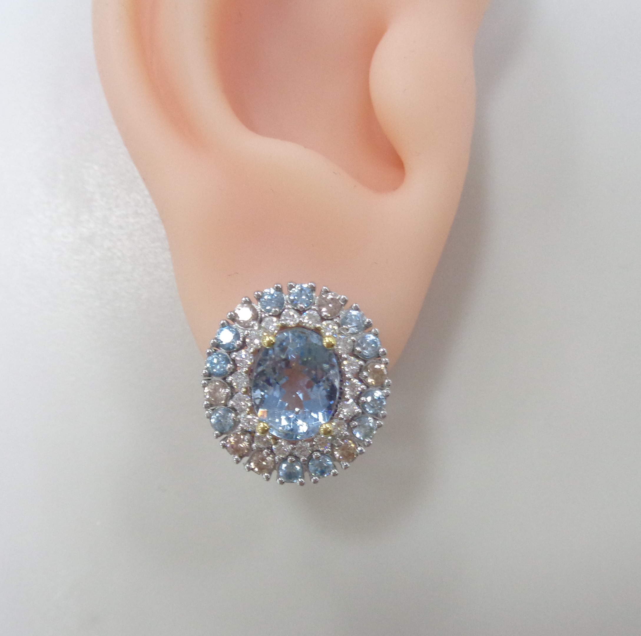 Серьги из комбинированного золота с аквамаринами